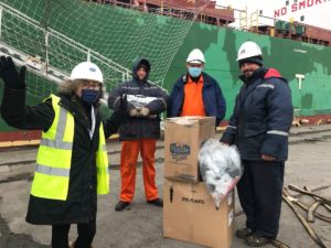 Deacon Diane delivers quilts to the crew of the Blacky.