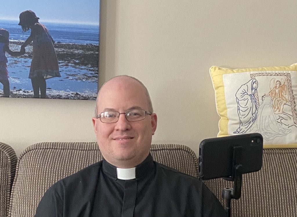 Tom Vaughn prepares to livestream from home to the people of St. David’s Welland.